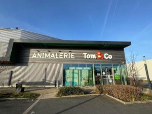 Photo enseigne : Tom & Co Leers